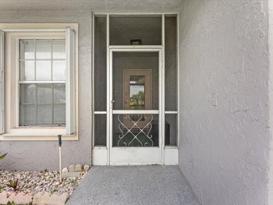 Welcome to this charming three-bedroom, two-bathroom residence - photo 5