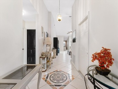 Welcome to this charming three-bedroom, two-bathroom residence - photo 6