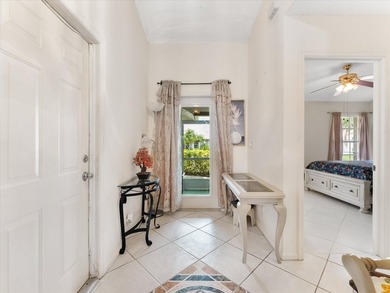 Welcome to this charming three-bedroom, two-bathroom residence - photo 7