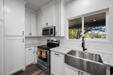 Welcome to your lakeside retreat in Rustling Oaks Estates on - photo 11