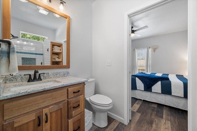 Welcome to your lakeside retreat in Rustling Oaks Estates on - photo 17