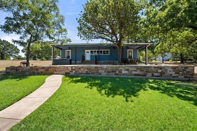 Welcome to your lakeside retreat in Rustling Oaks Estates on - photo 28