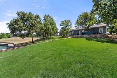 Welcome to your lakeside retreat in Rustling Oaks Estates on - photo 29