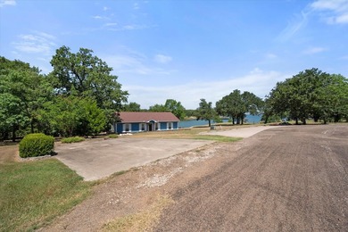 Welcome to your lakeside retreat in Rustling Oaks Estates on - photo 38