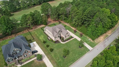 Situated on a generously sized golf course lot in Mount Vintage - photo 11