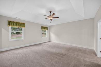 Situated on a generously sized golf course lot in Mount Vintage - photo 40