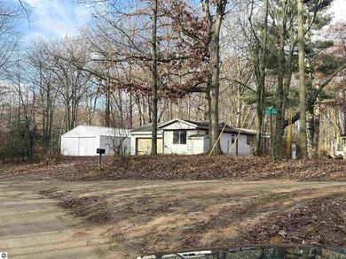 Lake Home For Sale in Weidman, Michigan