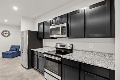 Welcome to this charming 3-bedroom, 2-bath villa in Avalon - photo 10