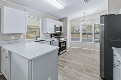 This newly remodeled manufactured home is located in the - photo 12