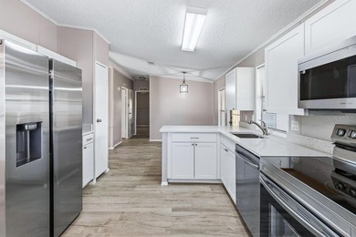 This newly remodeled manufactured home is located in the - photo 13