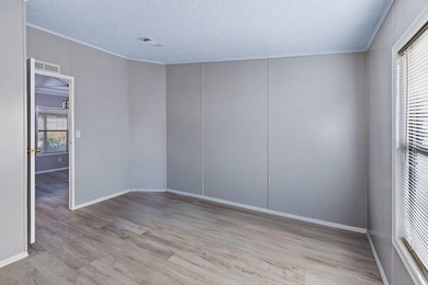 This newly remodeled manufactured home is located in the - photo 21