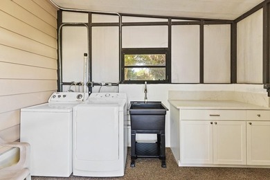 This newly remodeled manufactured home is located in the - photo 26