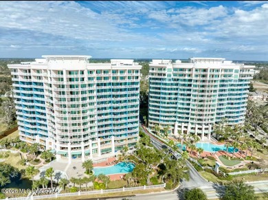 Experience luxury coastal living at its absolute finest in this - photo 1