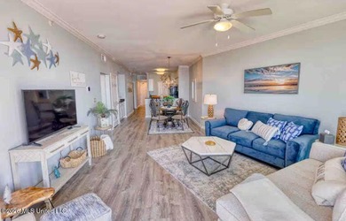 Experience luxury coastal living at its absolute finest in this - photo 3