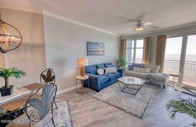 Experience luxury coastal living at its absolute finest in this - photo 4