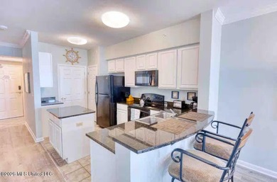 Experience luxury coastal living at its absolute finest in this - photo 9
