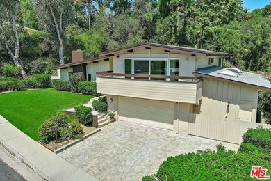 Welcome to 4117 Ellenita Avenue, a beautifully maintained - photo 2