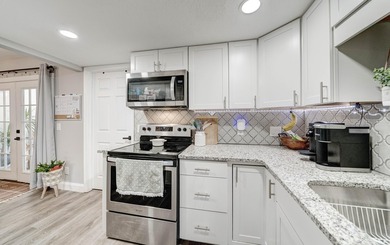 Welcome to 545 Palermo! This charming 3-bedroom, 2.5-bath - photo 11