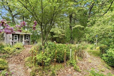 Set on nearly an acre in North Kingstown, this 3-bedroom, 1-bath - photo 12