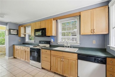 Set on nearly an acre in North Kingstown, this 3-bedroom, 1-bath - photo 19