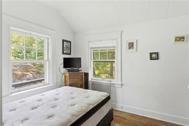 Set on nearly an acre in North Kingstown, this 3-bedroom, 1-bath - photo 24