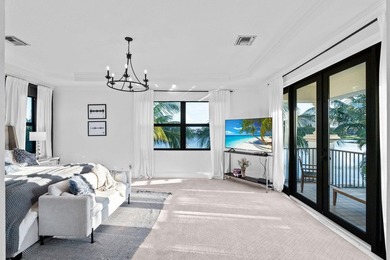 Beyond double entry doors, a remodeled iron staircase frames - photo 29
