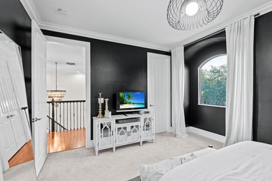 Beyond double entry doors, a remodeled iron staircase frames - photo 38