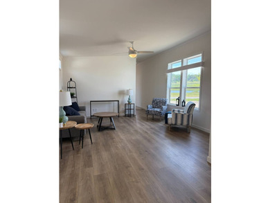 Welcome to the Outlook home, a thoughtfully designed 3-bedroom - photo 2