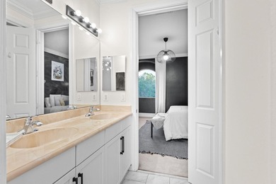 Beyond double entry doors, a remodeled iron staircase frames - photo 42