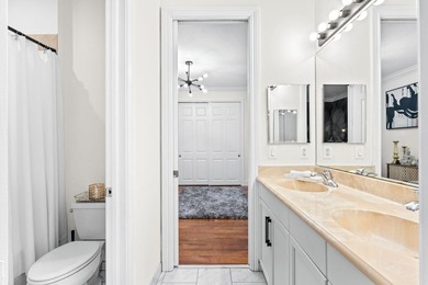 Beyond double entry doors, a remodeled iron staircase frames - photo 43