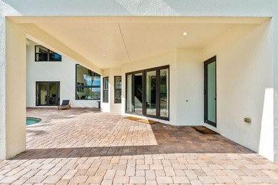 Beyond double entry doors, a remodeled iron staircase frames - photo 49