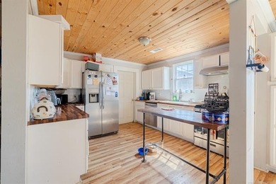 Farmhouse Chic in the Heart of Mannford! This charming 3-bedroom - photo 11