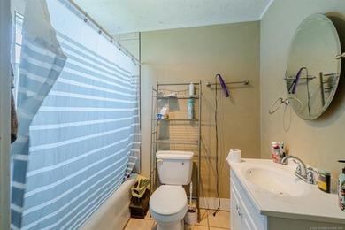 Farmhouse Chic in the Heart of Mannford! This charming 3-bedroom - photo 13