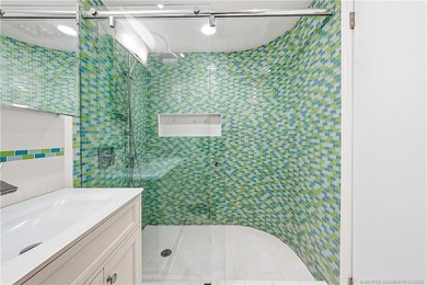 Beautifully renovated, direct oceanfront condominium offering - photo 24