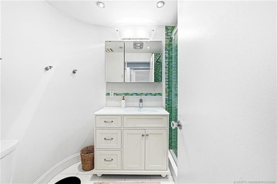 Beautifully renovated, direct oceanfront condominium offering - photo 26