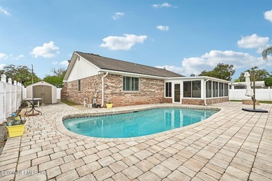 Welcome home to this immaculately maintained all-brick pool home - photo 1