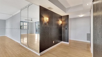 Discover this spacious corner two-bedroom, two-bath apartment