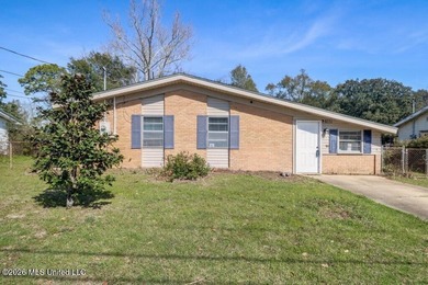 This charming Biloxi property is the perfect blend of comfort - photo 1