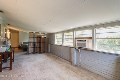 This charming Biloxi property is the perfect blend of comfort - photo 3