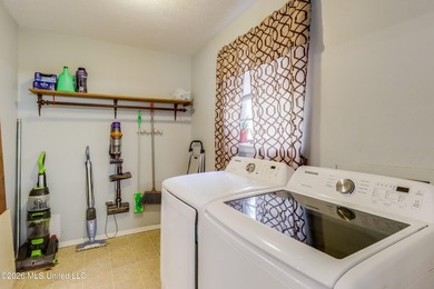 This charming Biloxi property is the perfect blend of comfort - photo 9