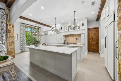 Nestled on a beautifully maintained lot, this stunning residence - photo 11