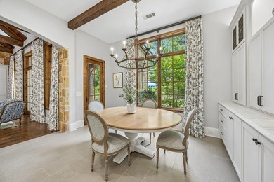 Nestled on a beautifully maintained lot, this stunning residence - photo 14