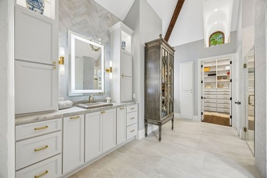 Nestled on a beautifully maintained lot, this stunning residence - photo 18