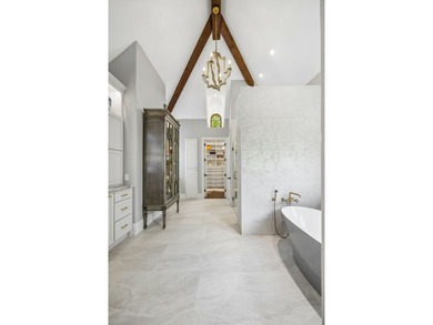 Nestled on a beautifully maintained lot, this stunning residence - photo 21