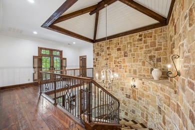 Nestled on a beautifully maintained lot, this stunning residence - photo 27