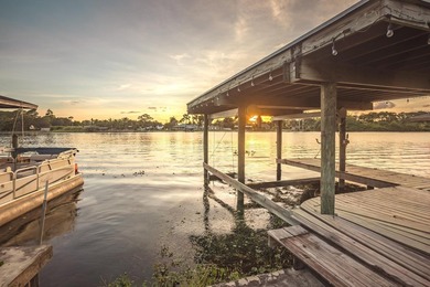 Welcome to this charming 3-bedroom, 2.5-bathroom waterfront - photo 1