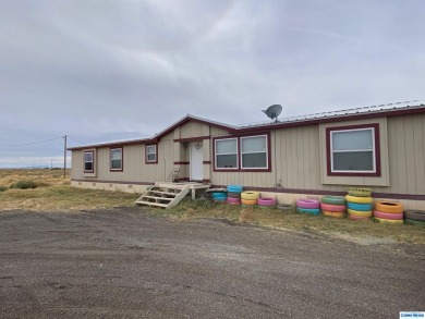Private, rural acreage with 3 manufactured homes on 60acres