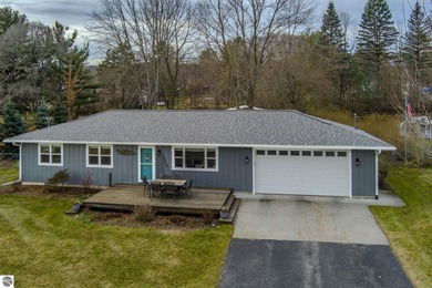 Antrim County Chain of Lakes Home For Sale in Bellaire Michigan