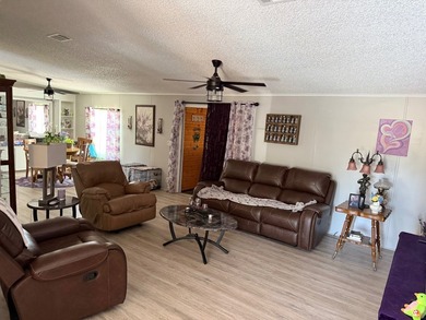 Leased Land Welcomes you to Pine Lakes! This large split-bedroom - photo 3