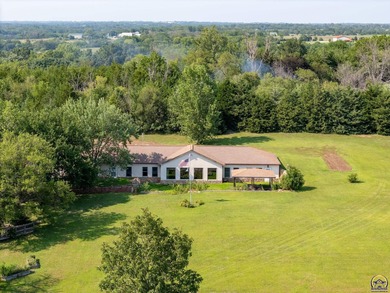 Discover the possibilities with this 3 bedroom, 2.5 bath berm